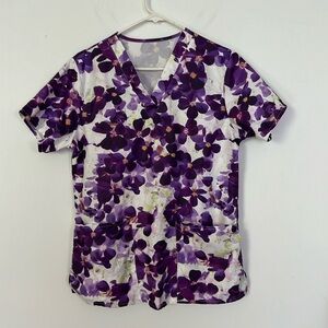 No brand or label, purple flower shrub top. 20” across front. 2 pockets